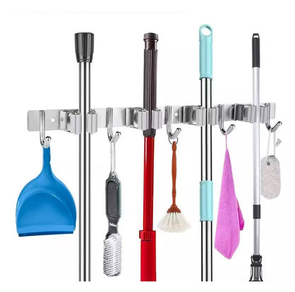 Organizador de pared de acero inoxidable – 7 ganchos para escobas, secadores, trapeadores y utensilios de limpieza.